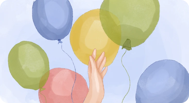 Hand of a child of immature parents releases balloons into the sky