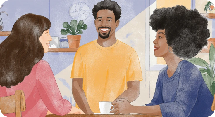 Young people sit in a group and smile, knowing how to talk to anyone